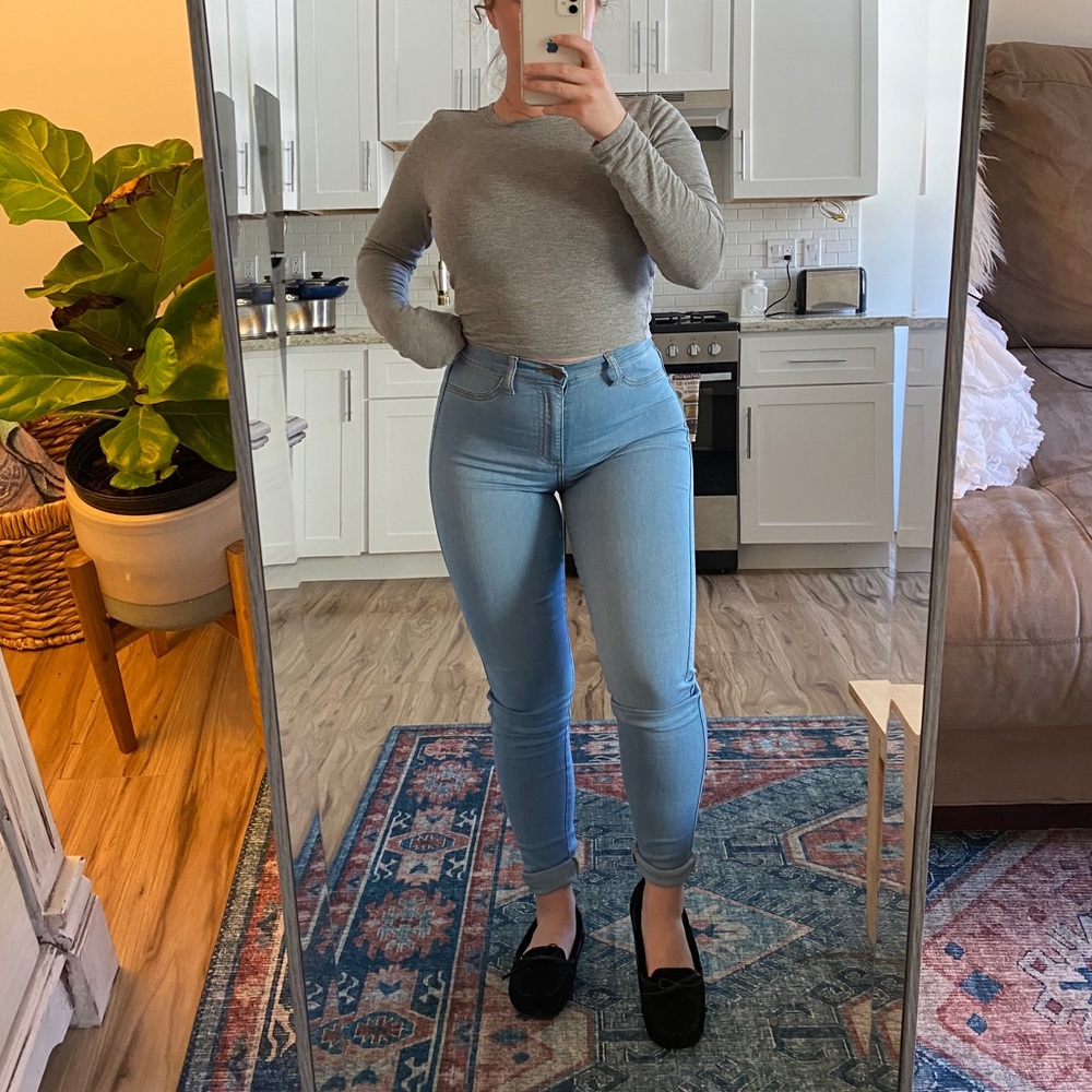 High waisted light blue jeans